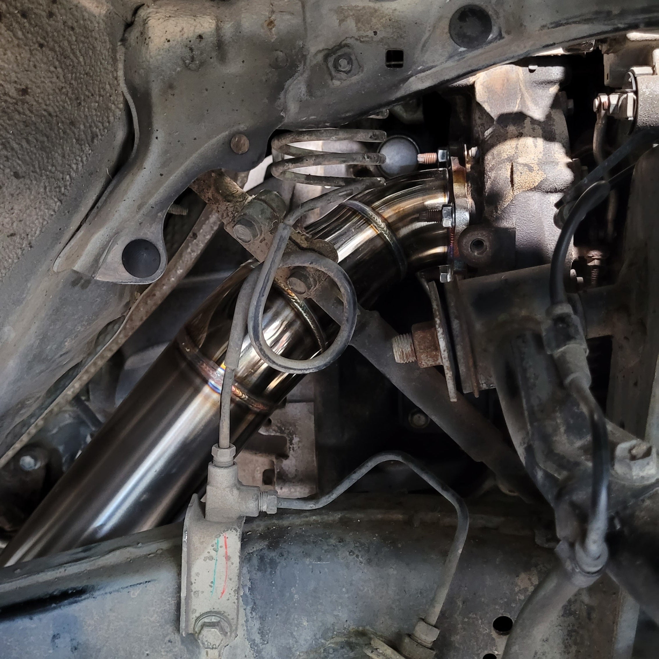 Alpha Boost Series - Toyota Hilux N70 3" Side Exit